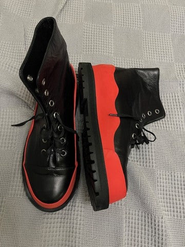 men boots with red line