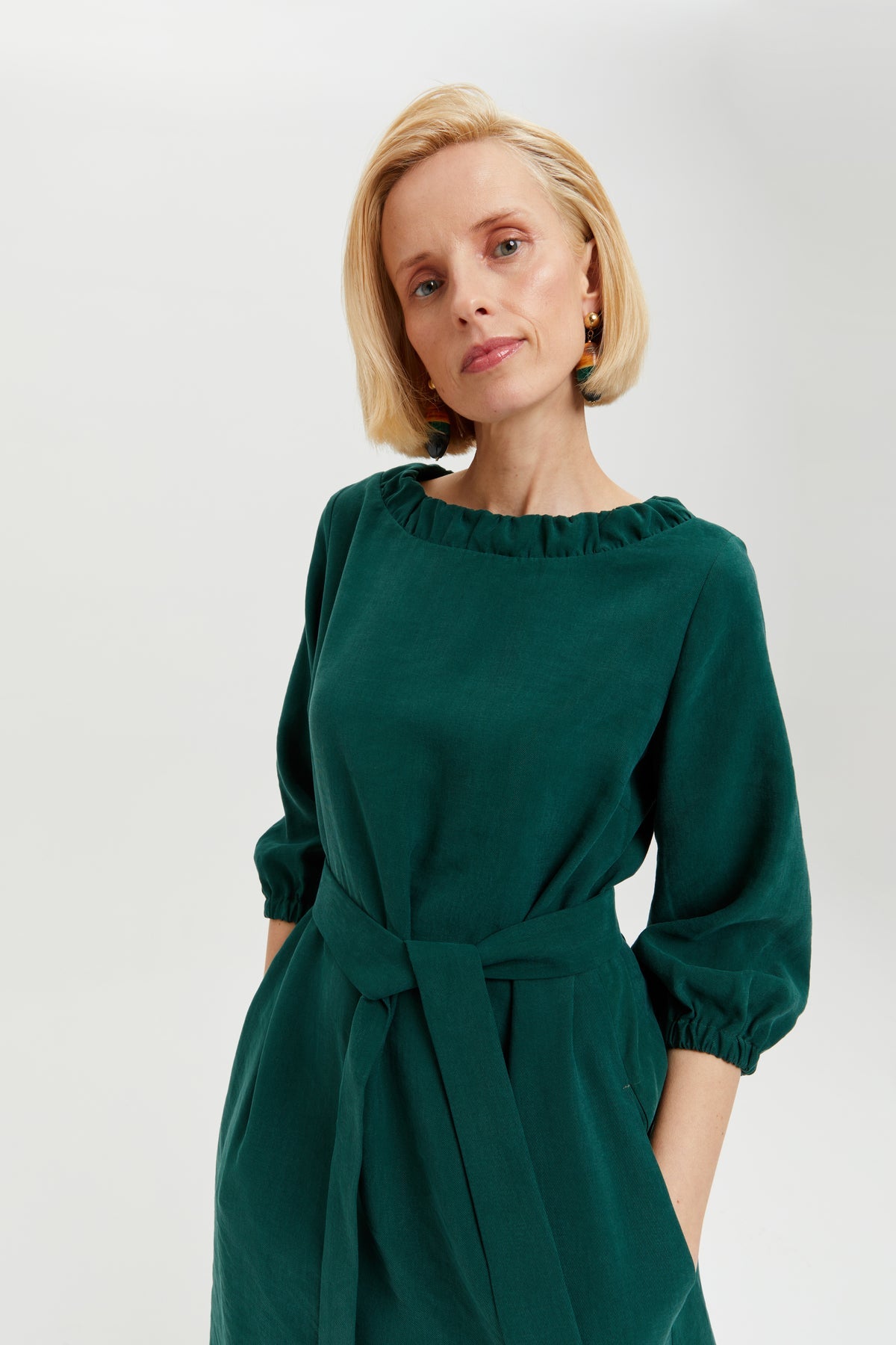 Celine | Elegant Belted Dress with Neckline Element in Forest Green